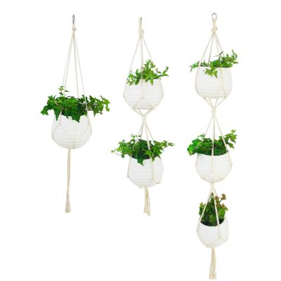 China Minimalist 3 Tier Planter Basket Cotton Indoor Outdoor Hanging Rope With Beads Macrame Plant Hanger for sale