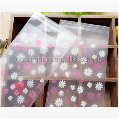 China BIODEGRADABLE Printing Clear Self Adhesive Plastic Gift Bags For Christmas Greeting Cards Packaging Gift Bag for sale