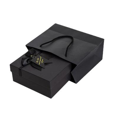 China Recycled Materials Black Bow Big Birthday Box Set Empty Hand Paper Gift Box Lipstick Box For Packaging for sale