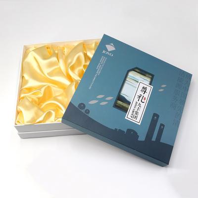 China Recycled Materials Printing Color Skin Care Packaging Box New Year Gift Box Cosmetic Tea Set Gift Paper Box for sale