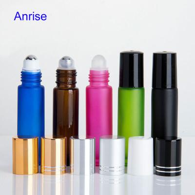 China Personal Care 10ml Frosted Amber Pink Blue Green Black Glass Roll On Bottle Matte Glass Roll Bottle With Gold Cap And Aluminum Metal Roller for sale