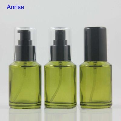 China Personal Care Cosmetic Packaging 30ml 1oz Shoulder Treatment Pump Oil Lotion Green Glass Oblique Bottle for sale