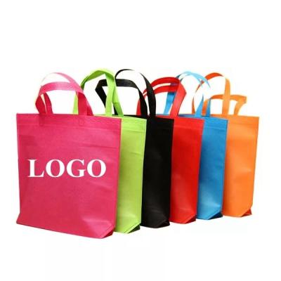 China eco-friendly a4 gold non woven bag stick fabric supermarket large non woven bag with handles with logo for sale