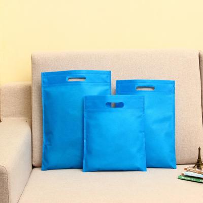 China Eco - Friendly Non Woven Fabric D Cut Bag Reusable Die Cut Non Woven Shopping Handle Fabric Carry Bags Manufacturer for sale