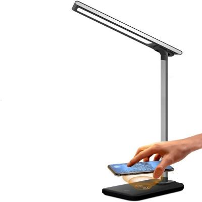 China Modern 10W LED Table Desk Lamp with Wireless QI Charger Alarm Clock Eye Protect Light Table Lamp for sale