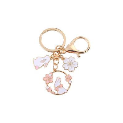 China Metal Factory Customized Cherry Blossom Rabbit Metal Keychain Car Key Chain Hanging Gift for sale