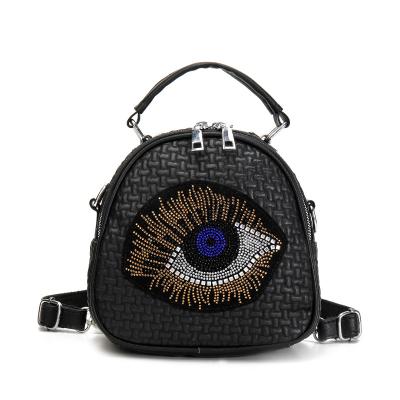 China Hot Selling Motion Detection Women Handbags Shoulder Backpack Fashion Ins Bag One Key Turkish Evil Eye Leather Cross Body Bag for sale