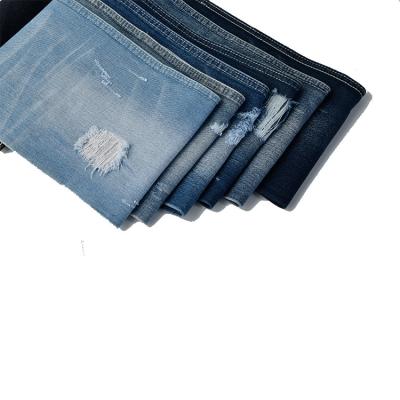 China Washed-out Stock Lot Fabrics Shrink-Resistant Denim Fabric For Jeans for sale