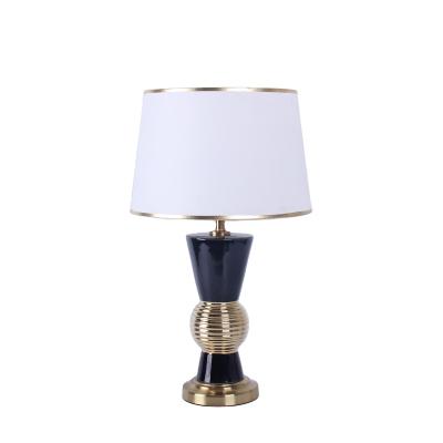 China Traditional hot selling post-modern pure black gilt personality living room bedroom bed decorated ceramic table lamps for sale