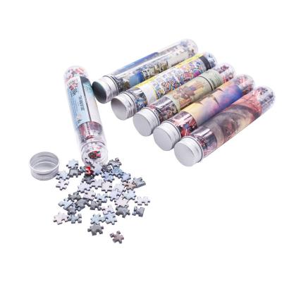 China Cartoon Toy Wholesale Factory OEM Printing Children Puzzle In Tube Plastic Jigsaw Puzzle 150 Pieces Custom Mini Jigsaw Puzzle for sale