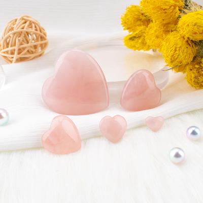 China Europe Natural Stone 100% Rose Quartz Heart Crystal Healing Stone 1 Inch For Energy Reiki Healing for sale