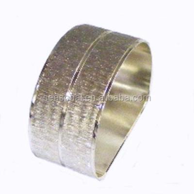 China Viable Wholesale Stock Fast Delivery Textured Flat Bottom Napkin Rings Wedding Decoration Silver Gift for sale