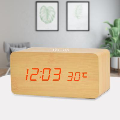 China Antique Wooden Table Clock Mobile Phone Radio Hotel Style LED Digital Charging Alarm Clock With Temperature Display for sale