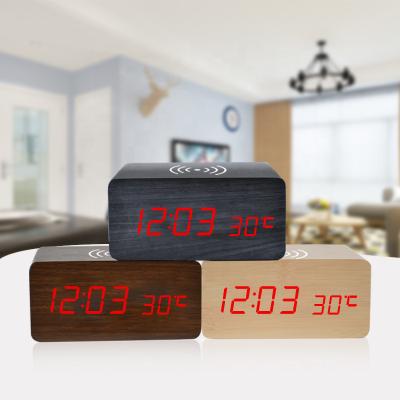 China Antique Style Wooden LED Digital Alarm Clock with Filling Desk Clock Wireless Phone Table Clock Custom Logo New Design for sale