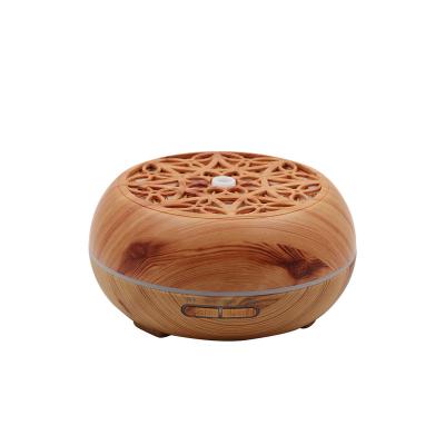 China Fashional Most Popular Unique Led Hollowed Out Aroma Diffusers Remote Control Wood Grain Humidifiers for sale