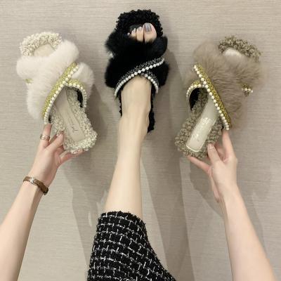 China CUSHIONING Xiaoxiangfeng Plush Slippers Women's Autumn Korean Version Flat Bottom Women's Slippers Cross Pearl New for sale