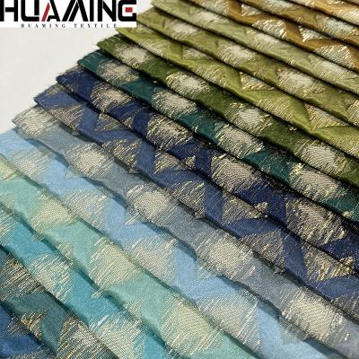 China Hot Selling Anti-Static Multicolor Lurex Upholstery Metallic Christmas Stock Up Yarn Dyed Woven Fabric For Home Decor for sale