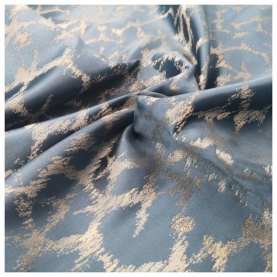 China Shrink-Resistant Silk Fabric Looks Metallic Stock Upholstery Hometextile Woven Fabric From China for sale