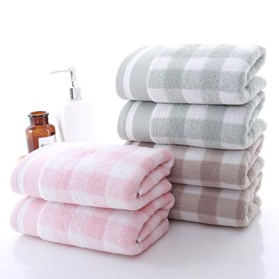 China Viable Customizable Home Towel Plaid Face Wash Essential Soft Absorbent Towel for sale