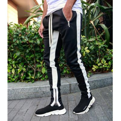 China Anti-Wrinkle Elasticity Leg Zipper Outdoor Fitness Exercise Trouser Pants Men Outdoor Casual Sports Shaping Pencil Pants for sale