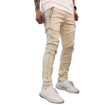 China Anti-Wrinkle Lightweight Fit Men's Body Elasticity Outdoor Casual Sports Reflective Lines Shaping Cargo Hiphop Pants Pants for sale