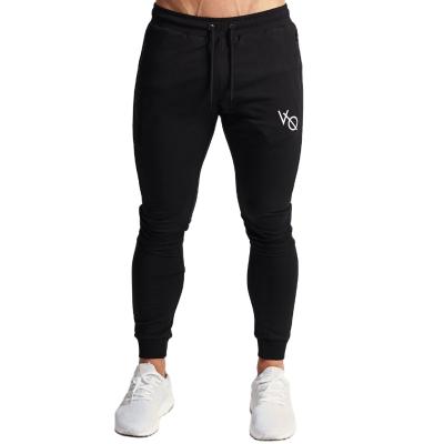 China Anti-wrinkle sport style color joggers men's fitness elasticity single sport joggers refine sports jogger men pants for sale