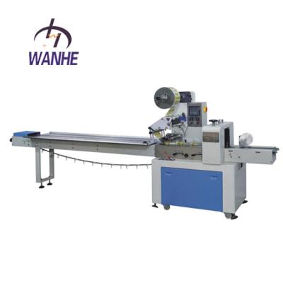 China WANHE Small Food Candy Wrapping Machine Cake Chocolate Candy Flow Wrapping Wrapping Machine for sale