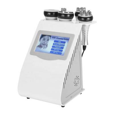 China Hot Selling Weight Loss Multifunctional 5 in 1 Vacuum Cavitation System Body Sculpting Fat Dissolving Machine for sale