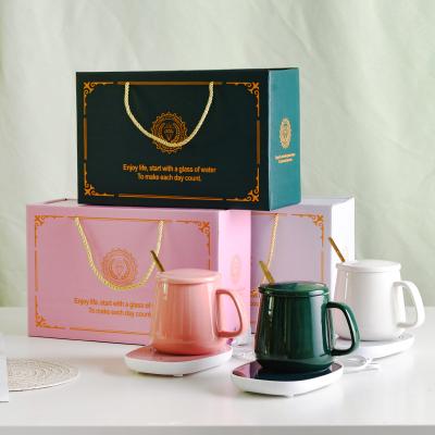 China 55 Degree Sustainable Ceramic Mug With Box Creative Wedding Logo Smart Christmas Gifts Heater Porcelain Coffee Mugs Warmer Mug Package for sale