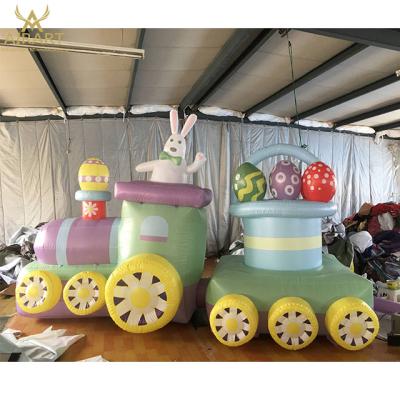 China 420D Oxford Cloth Custom Inflatable Easter Festival Props , Inflatable Easter Train With Bunny for sale