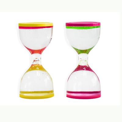 China Home Decoration Beautiful Cylindrical Colorful Acrylic Mini Liquid Decorative Hourglass for sale