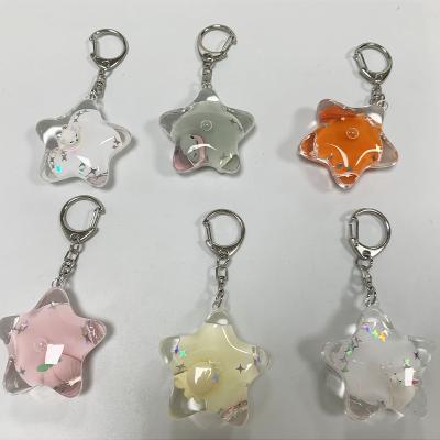 China Eco Friendly Star Shape Adding Oil Water Acrylic Keychains Animals Rover 3D Key Chains for sale