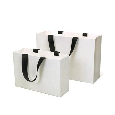 China Handmade Wholesale Custom Printed Cute Boutique Branded Packaging Gift Shopping Paper Bags With Logo for sale