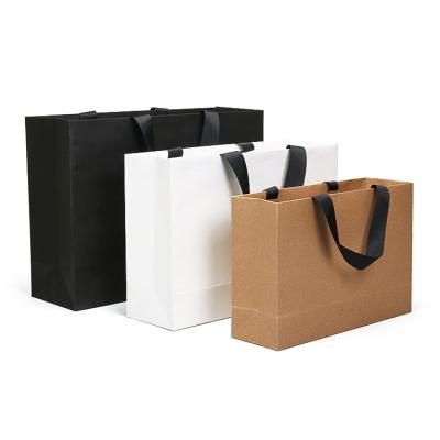 China Handmade Wholesale Logo Design Promotion Luxury Clothing Retail Gift Shopping Jewelry Custom Printed Paper Bag With Handle for sale