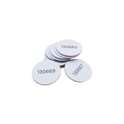 China Diameter 15mm 18mm 20mm 25mm EM4305 T5577 125khz PVC 125khz hot sell rewritable token empty coin tag for sale