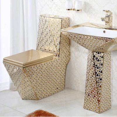 China Double-Flow Modern Sanitary Ware Bathroom Dresser Luxury Gold Toilet Wall Hung Toilet Siphnoic Gold Color Oval Toilet for sale