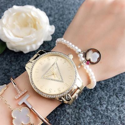 China Auto Date luxury rhinestone band strap watch reloj metal cheap watch Stainless Steel case material diamond encrusted triangle watch for sale