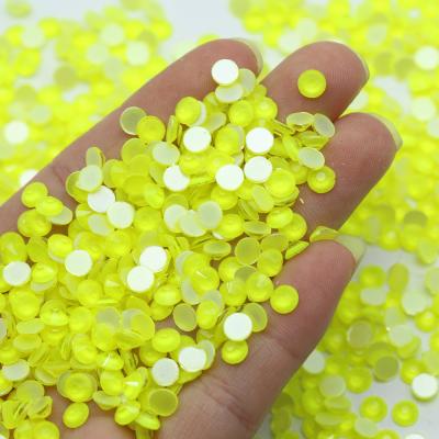 China New Flatback XULIN Style SS6-SS30 Regular Cut Faceted Fluorescent Nail Art Glass Neon Yellow Rhinestone Glow Under UV Light for sale