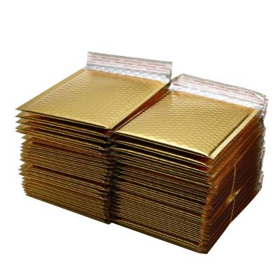 China Cosmetic Metallic Gold Foil Padded Envelopes Shipping Poly Bubble Packaging Mailers Bag for sale