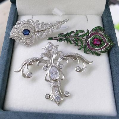 China 925 High Quality Fashionable Peacock Feather Silver Cross Brooches For Man Woman for sale