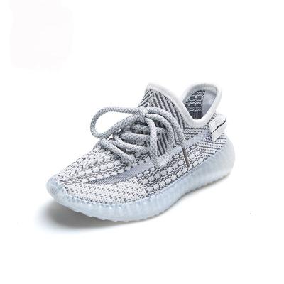 China Deodorization Fashion Mesh Breathable Lace Up Kids Warm Casual Sports Running Shoes Wear Fly Knit Children Shoes for sale