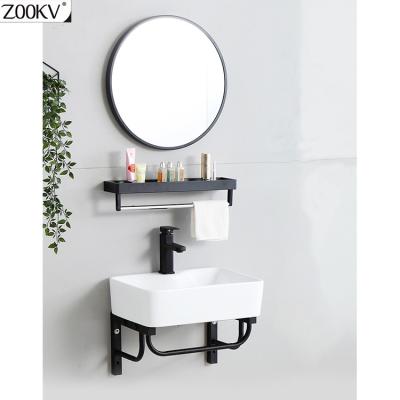 China Modern Wall Mounted Ceramic Vanity Combination Bathroom Basin And Metal Bracket for sale