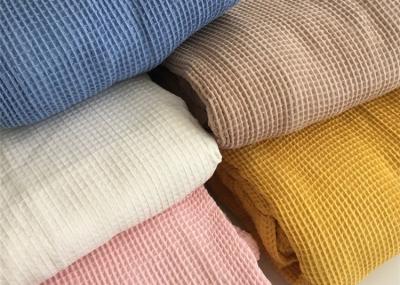 China 100%cotton knitted fabric popular in autumn/winter CVC waffle fabric for hotel pajamas, nightgowns and slippers for sale