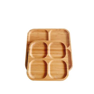 China 4 Compartments Sustainable Round Cheap Dry Bamboo Wooden Snack Divider Tray Fruit Serving Dishes for sale