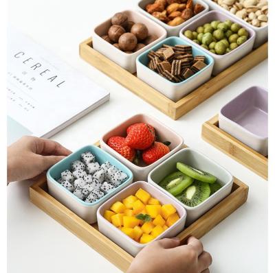 China Sustainable Ceramic Fruit Tray Divided Snack Fruit Dry Candy Bamboo Trays With Ceramic Bowls Dishes With Wooden Tray for sale