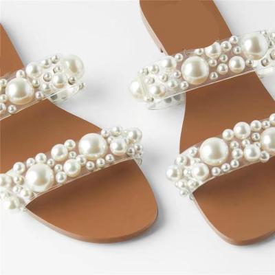 China Fashion trend plus size women's pearl sandals summer fashion ladies new two straps pearl slippers flat sandals for sale