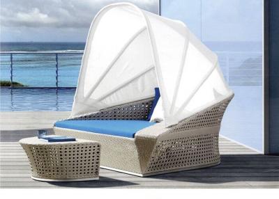 China Half Oval Style PE Rattan Sun Bed Patio Furniture Chaise Lounge With Canopy for sale