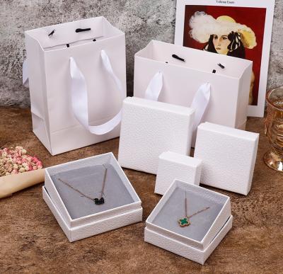 China Fashionable Custom White Paper Jewelry Box Skin Grain Ornaments Receive Boxes For Jewelry Storage Box for sale