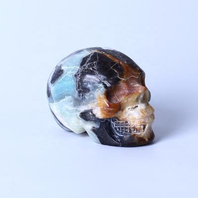 China Wholesale High Quality Natural Gemstone from Europe Healing Skull Crystal For Home Collection from Crystal Handmade Carvings Caribbean Calcite for sale