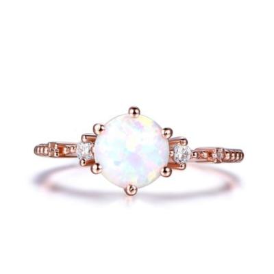 China Africa 6.5mm Round Natural FASHIONABLE Opal Engagement Ring Full Cut Diamond Wedding Ring In 14k Rose Gold for sale